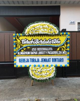 Papan Bunga Duka di Carenang